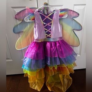 Gorgeous girls fairy unicorn 🦄 costume size 4-6. Comes with wings and headband.
